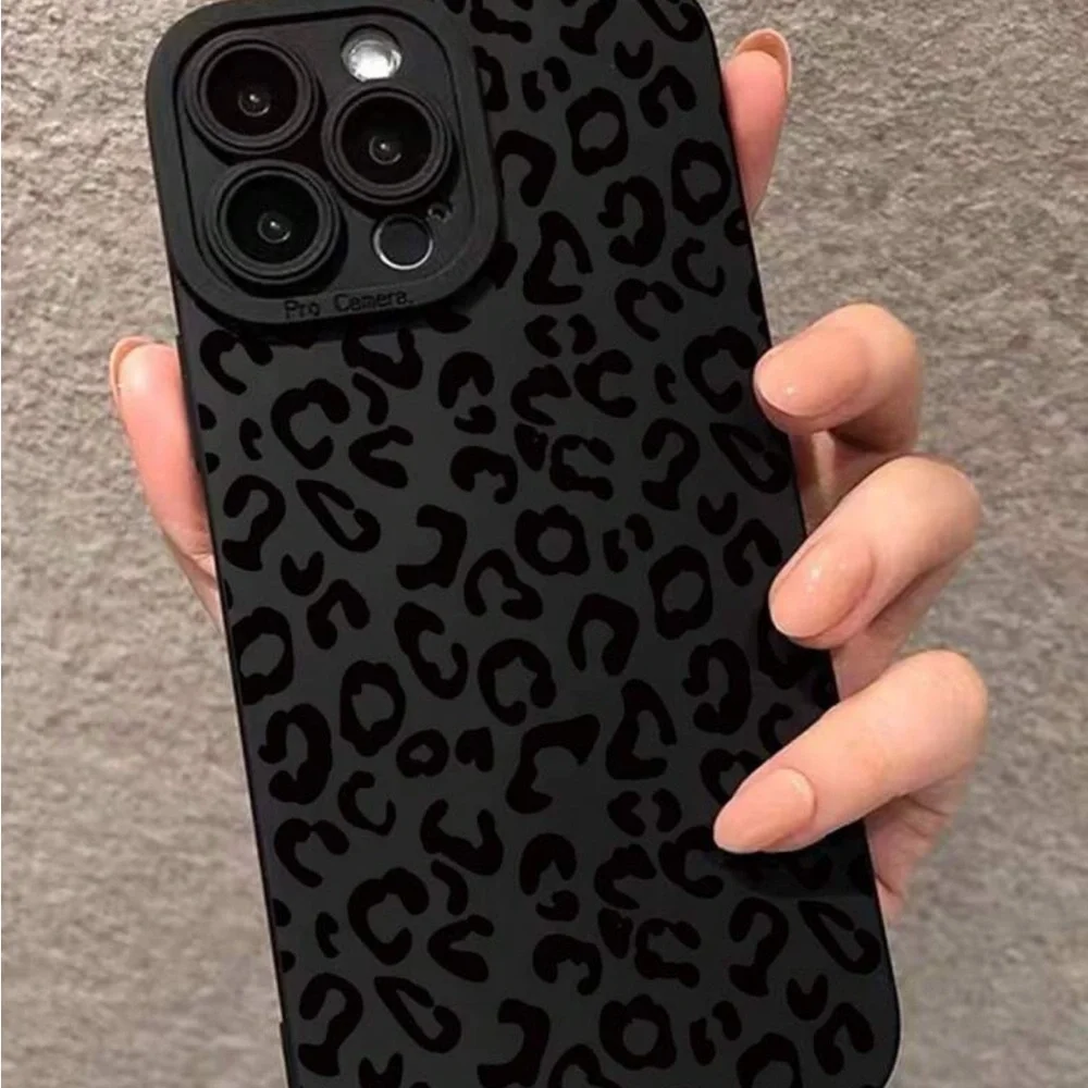 iPhone 14 Pro black leopard print phone case
